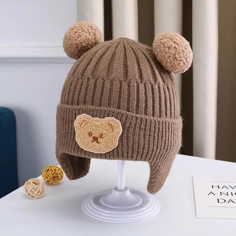 Bonnet bébé en laine avec oreilles d’ours