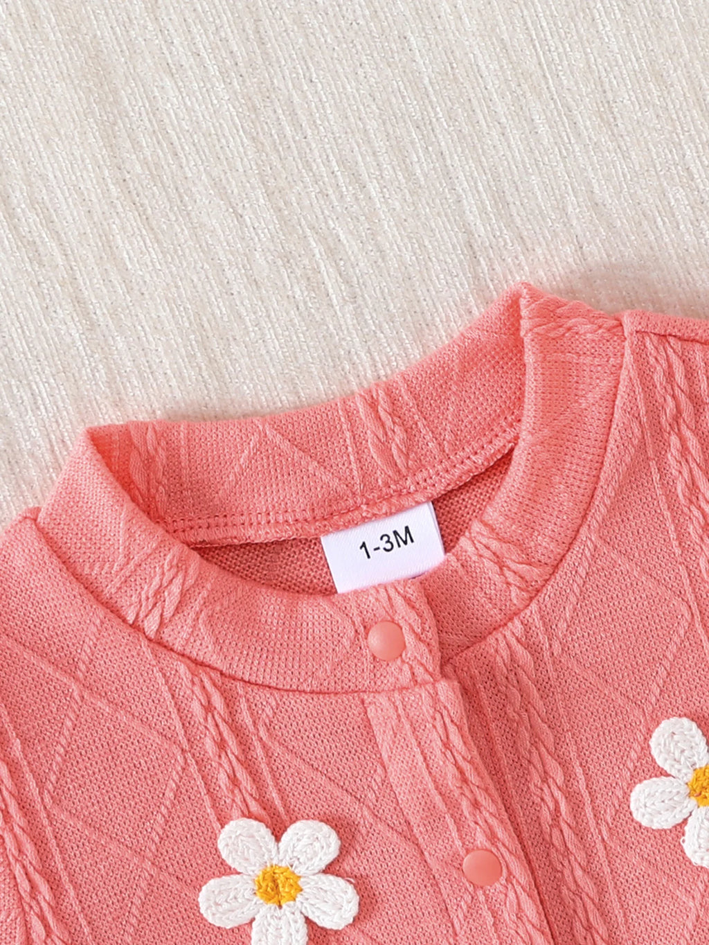 Pyjama bébé rose à fleurs brodées