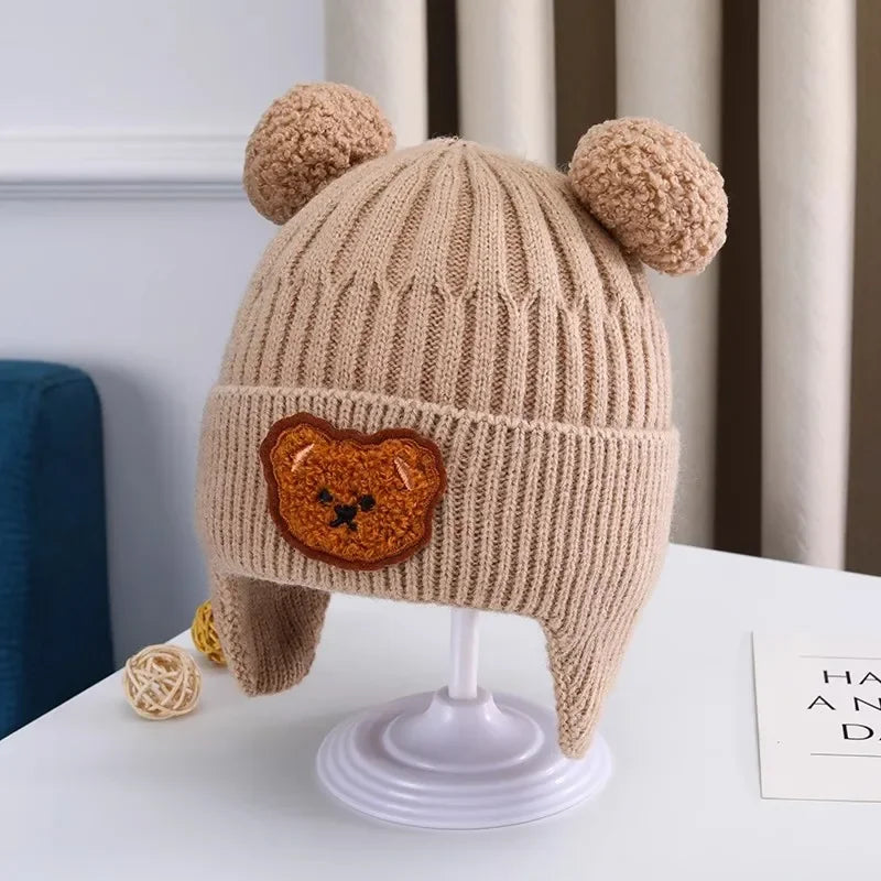 Bonnet bébé en laine avec oreilles d’ours